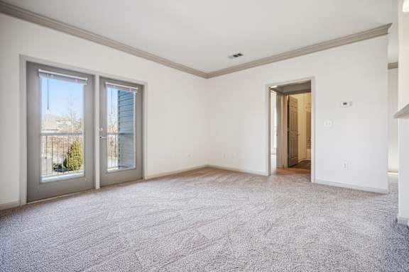 Spacious Living Area with Carpet
