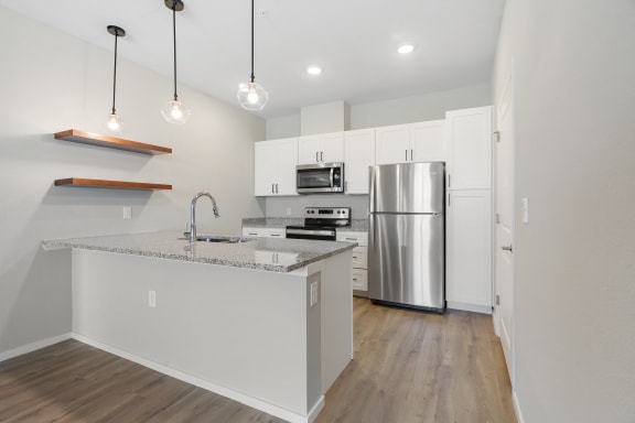 Fully-Equipped Kitchen with White Appliances