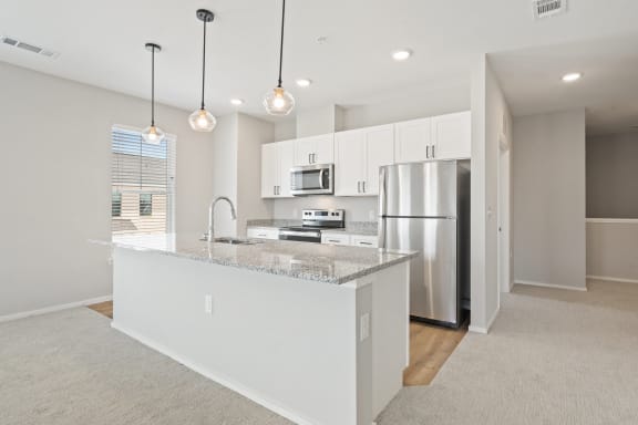 Fully-Equipped Kitchen with White Appliances