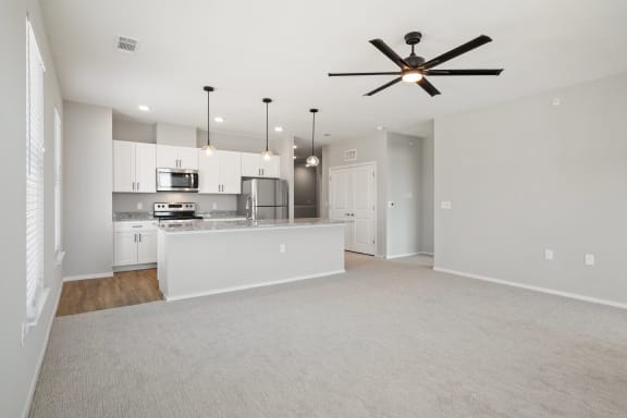 Spacious Living Area with Carpet