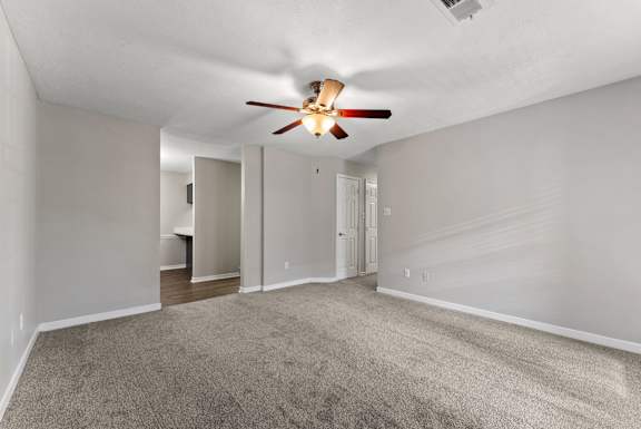 Spacious Living Area with Carpet