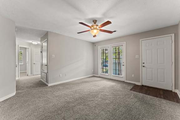 Spacious Living Area with Carpet