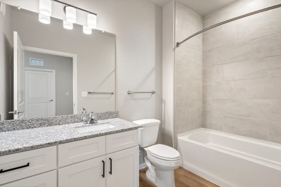 Bathroom With Granite Vanities