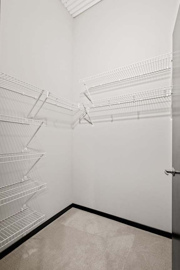 Walk-In Closet With Built-In Shelving