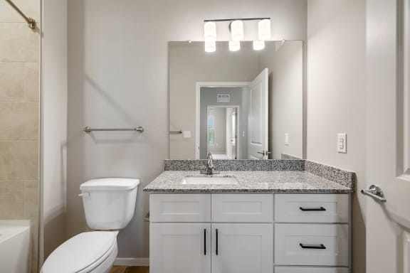 Bathroom With Granite Vanities