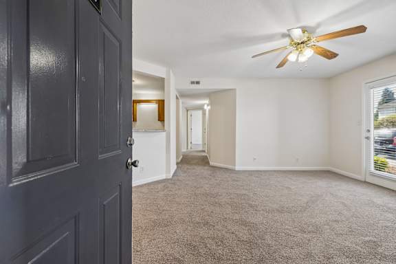 Spacious Living Area with Carpet