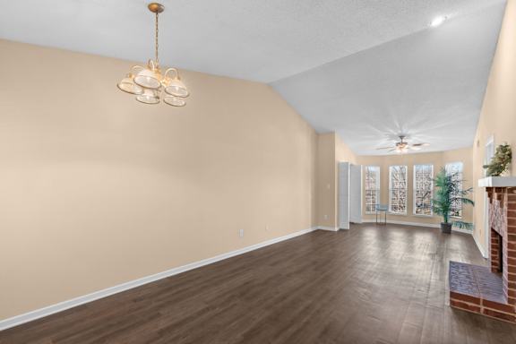Spacious Living Area With Wood-Style Flooring