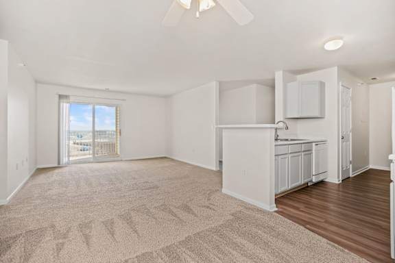 Spacious Living Area with Carpet
