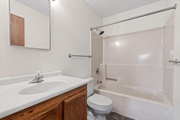 Bathroom with Wood cabinetry