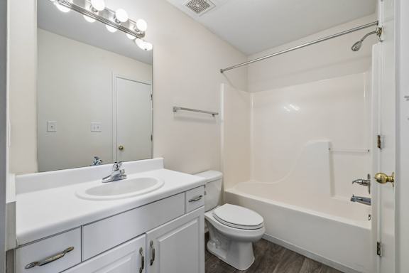 Bathroom with Wood cabinetry