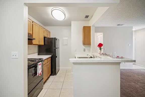 Kitchen with Counter Seating Overhang