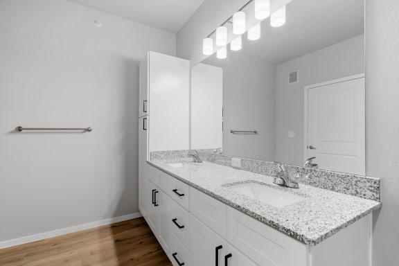 Bathroom With Granite Vanities