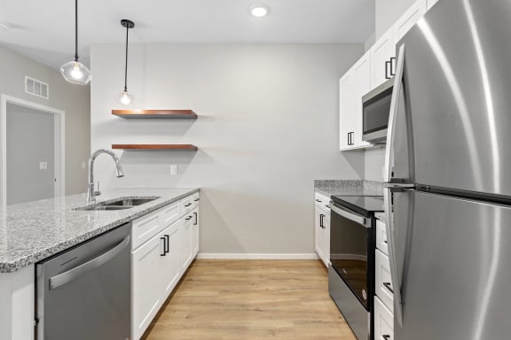 Kitchen with Granite Countertops and Stainless Steel Appliances