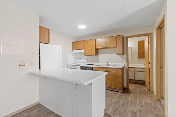 Kitchen with Counter Seating Overhang