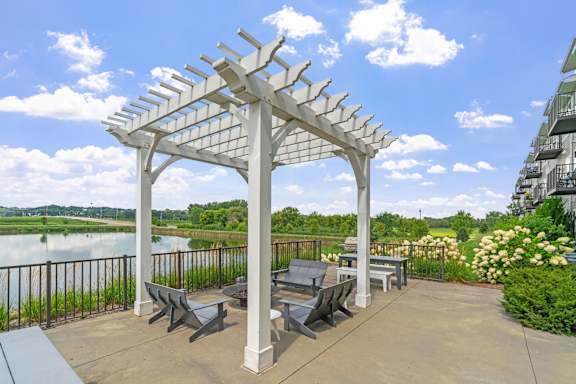 White pergola with firepits