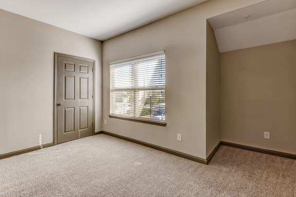 Spacious Bedroom with Plush Carpeting