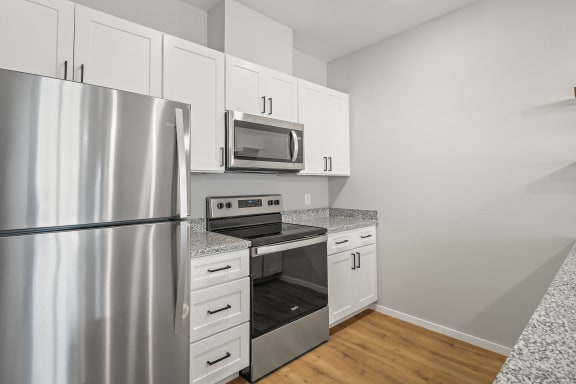 Fully-Equipped Kitchen with White Appliances