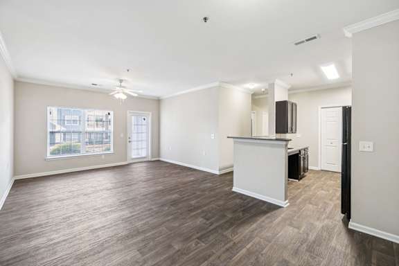 Spacious Living Area With Wood-Style Flooring
