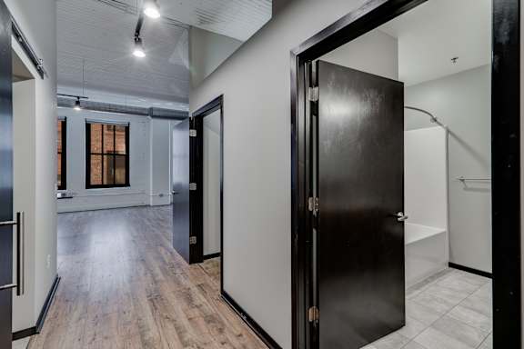Spacious Living Area with Hardwood-Style Flooring