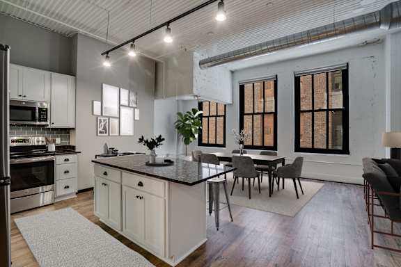 Spacious Living Area With Wood-Style Flooring