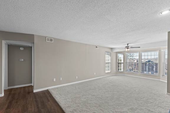 Spacious Living Area with Carpet