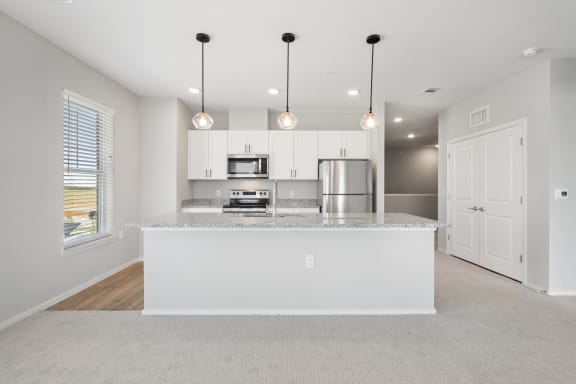 Fully-Equipped Kitchen with White Appliances