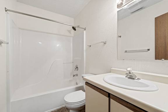 Bathroom with Wood cabinetry