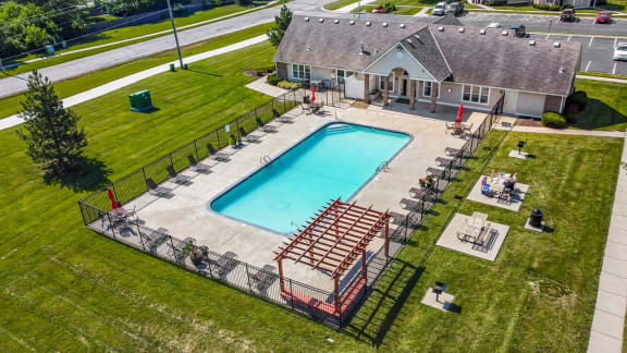 Aerial View Of The Pool Area With Pergola & Picnic Tables