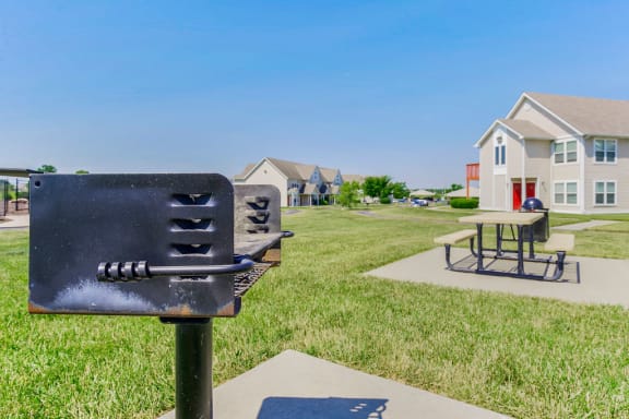 Outdoor BBQ Grill Near Picnic Table