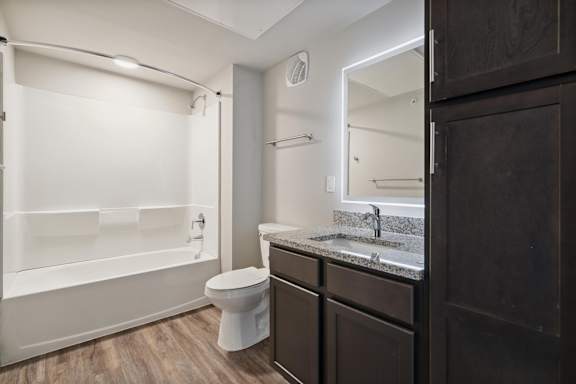 Bathroom with Dark Brown Cabinets