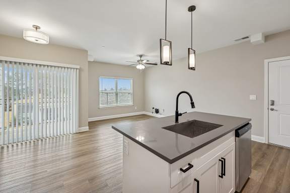 Kitchen with White Cabinetry and Stainless Steel Appliances
