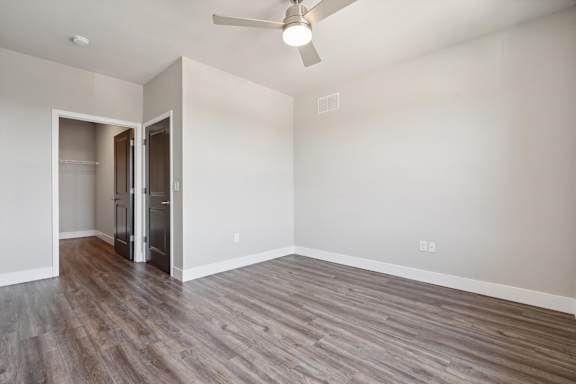Bedroom with Wood-style flooring