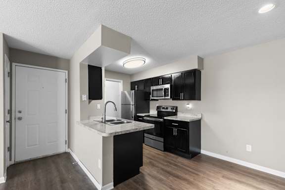 Fully Equipped Kitchen with Stainless Steel Appliances