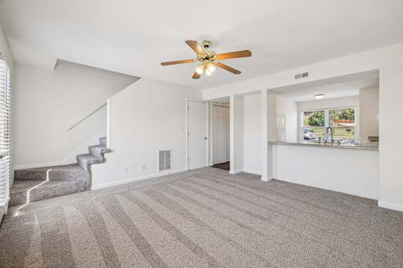 Spacious Living Area with Carpet