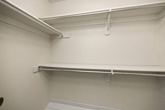 Walk-In Closet With Built-In Shelving