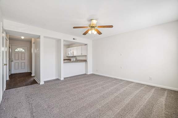 Spacious Living Area with Ceiling Fan