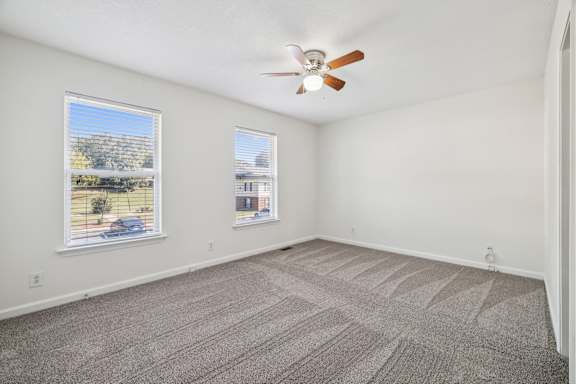 Spacious Bedroom with Plush Carpeting