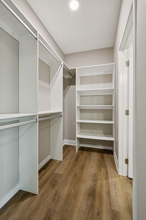 Walk-In Closet With Built-In Shelving
