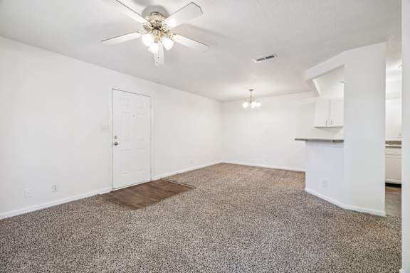 Spacious Living Area with Carpet