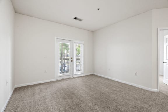 Spacious Living Area with Carpet