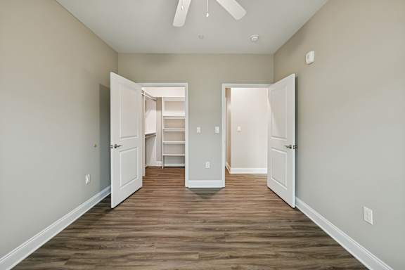 Bedroom with Wood-style flooring