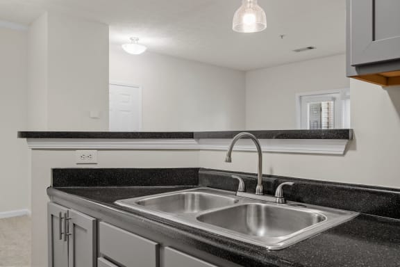 Kitchen with Black Countertop