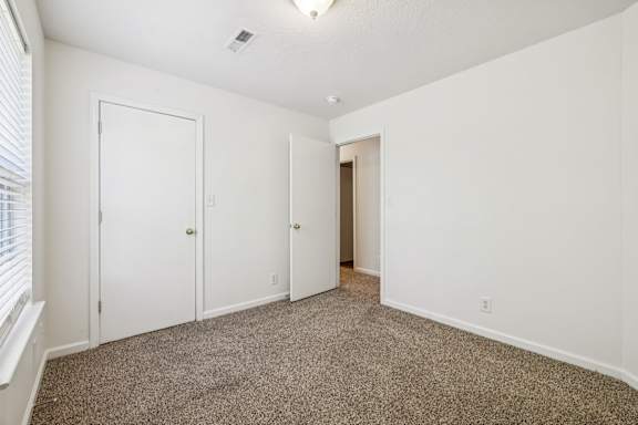 Bedroom with Overhead Lighting
