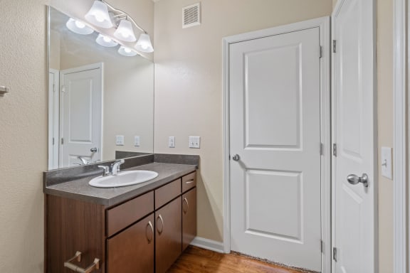 Bathroom With Granite Vanities