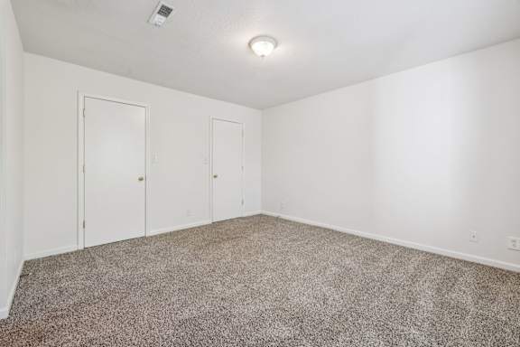 Spacious Bedroom with Plush Carpeting