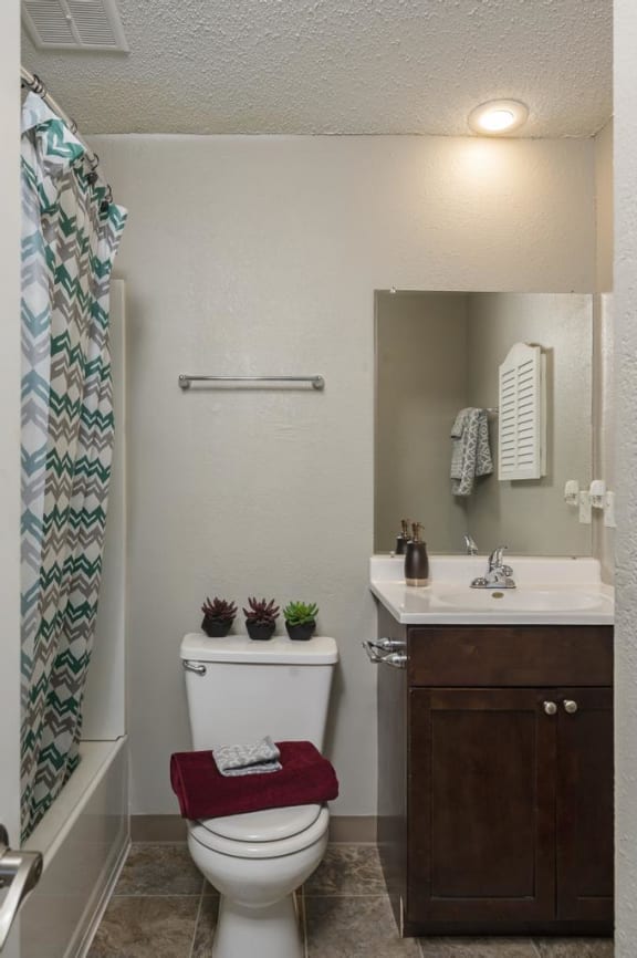 Bathroom With Tiled-Style Flooring