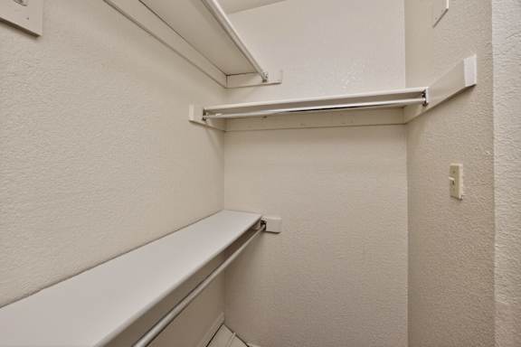 Walk-In Closet With Built-In Shelving