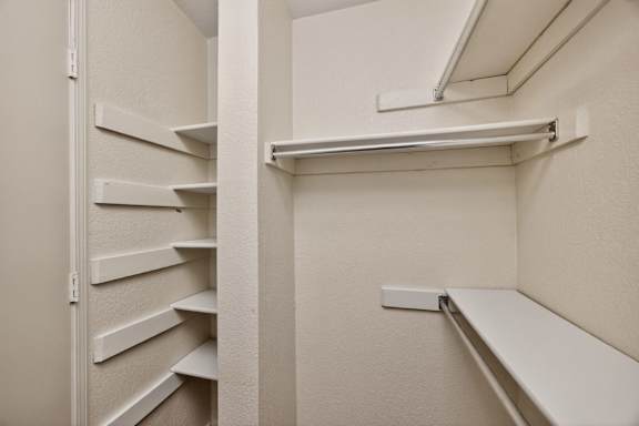 Walk-In Closet With Built-In Shelving
