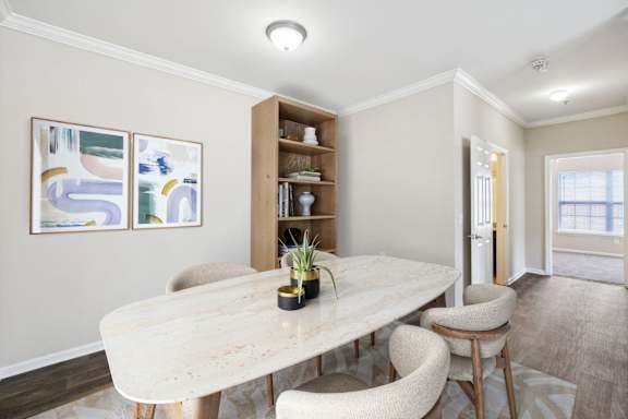 Spacious Dining Area With Wood-Style Flooring