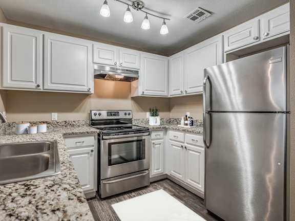 Fully Equipped Kitchen with Stainless Steel Appliances